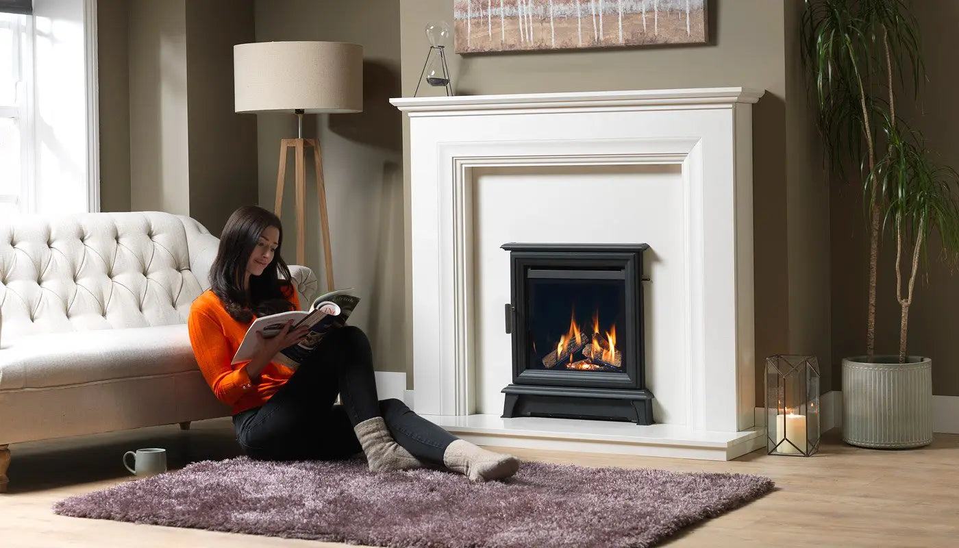 Ravel 400 Inset gas stove in cream fireplace surround